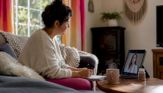 Woman consulting doctor about supplements via laptop