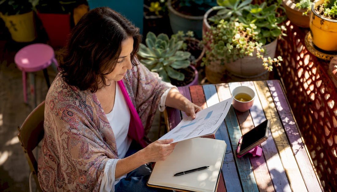 Woman at kitchen table managing brain fog