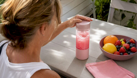 Pouring electrolyte drink into glass