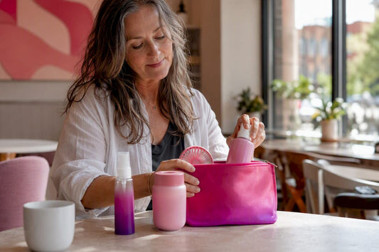 Woman packing menopause travel kit